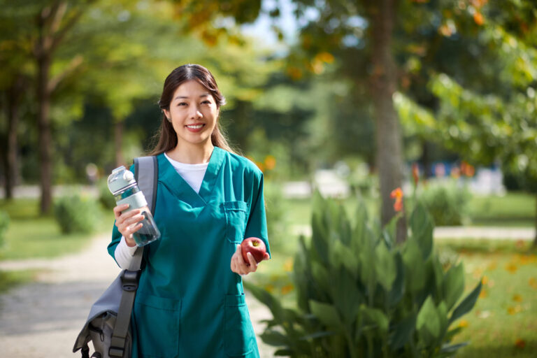 medical-nurse-spending-lunch-in-park-2023-11-27-05-13-24-utc-scaled