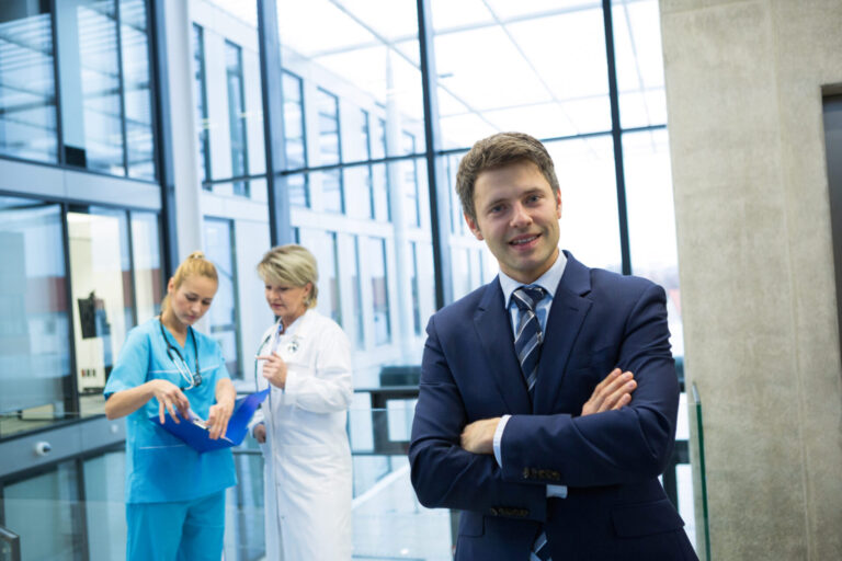 portrait-of-businessman-standing-with-arms-crossed-2023-11-27-04-50-41-utc-scaled-e1720715055228