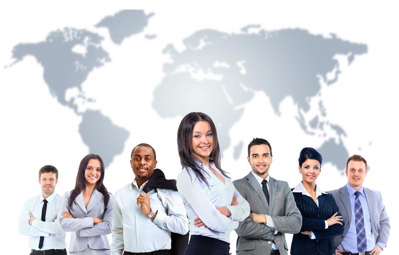 Group of professionals in business dress standing in front of world map. 